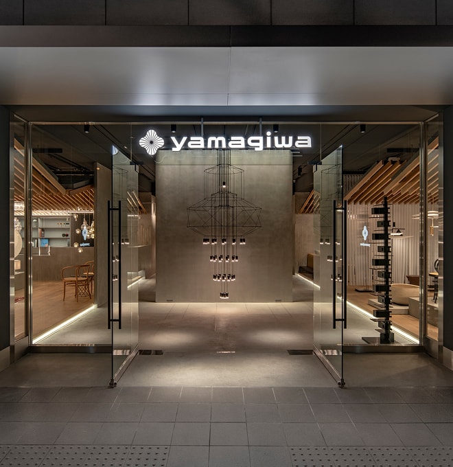 A YAMAGIWA pendant light installed in an outdoor setting